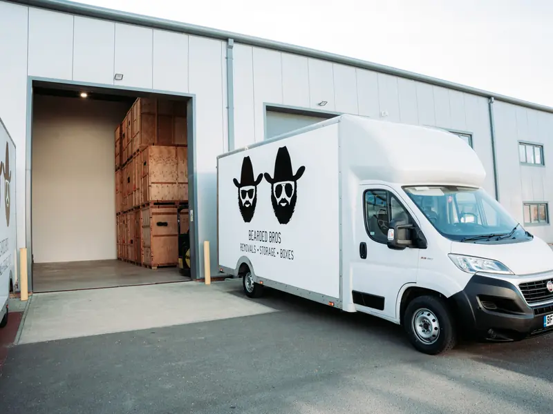 Bearded Bros removals van reversed into a depot loading bay