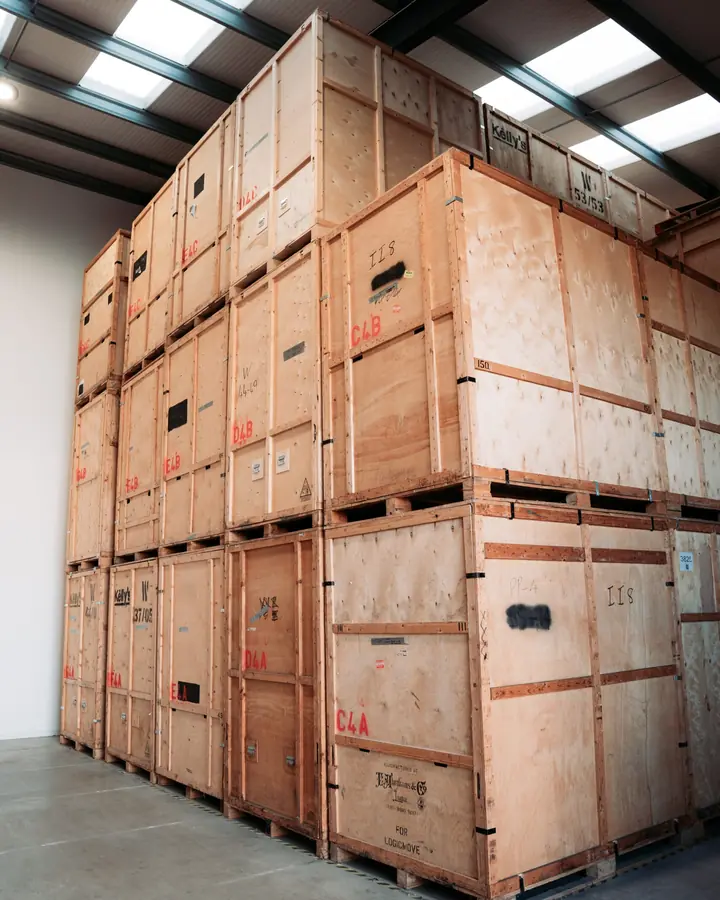 Wooden storage crates stacked floor to ceiling in the Bearded Bros storage warehouse