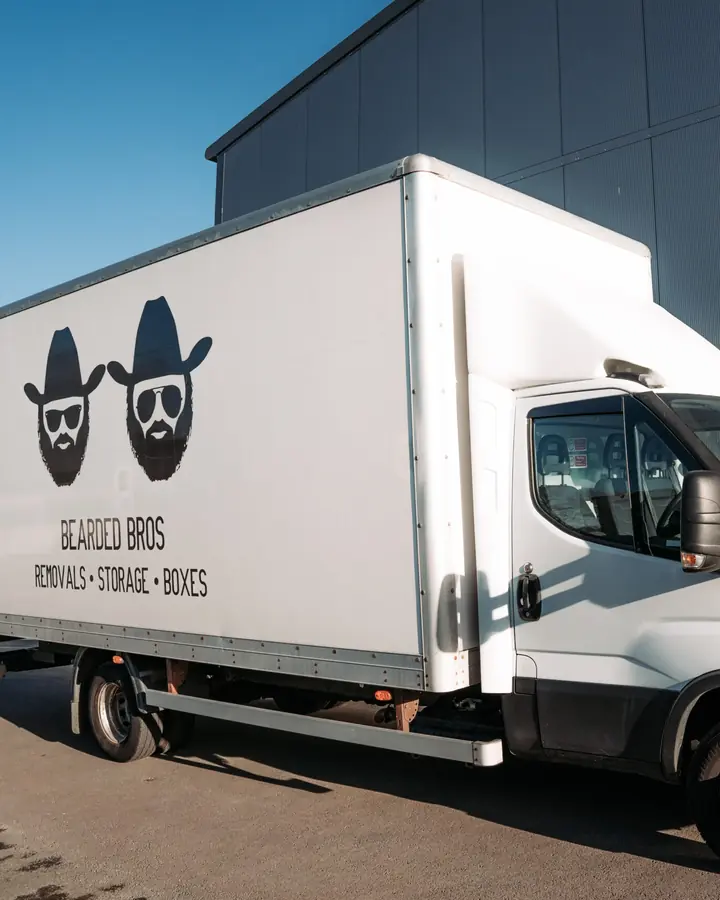 Bearded Bros branded removals van parked outside the depot